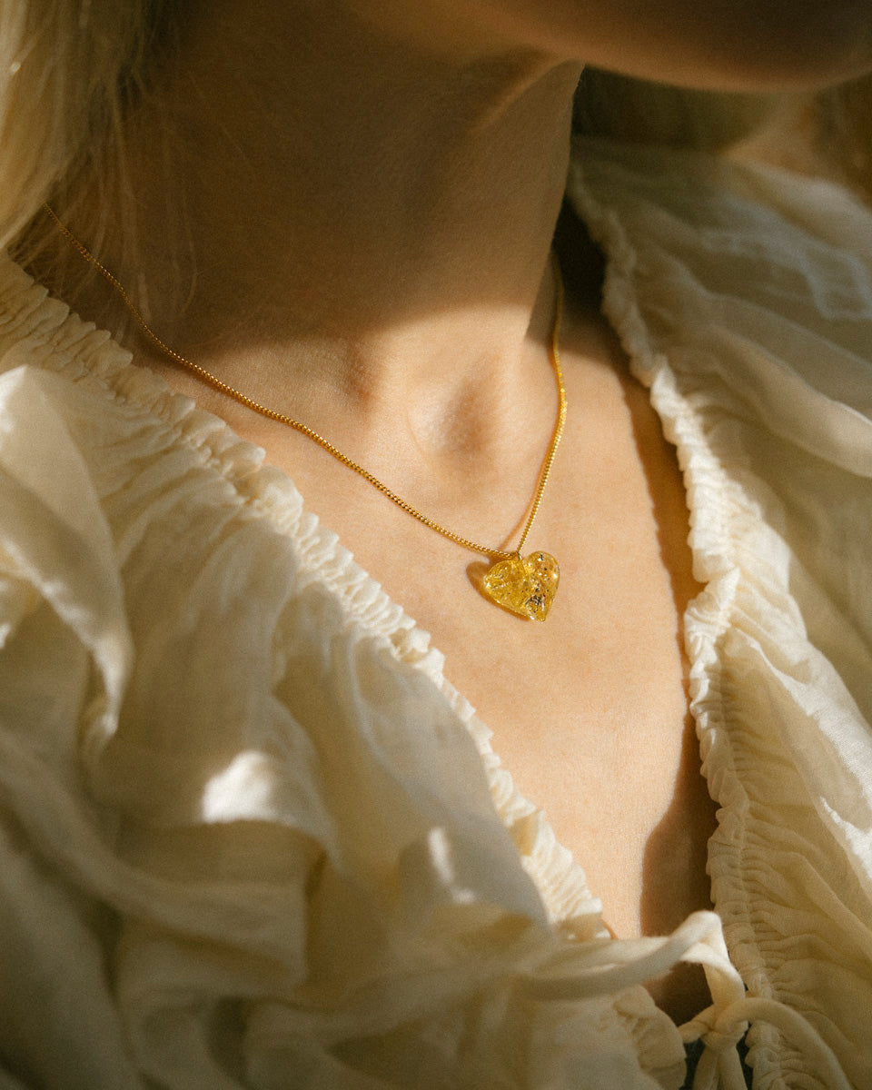 Dzintara kulons "Sirds"