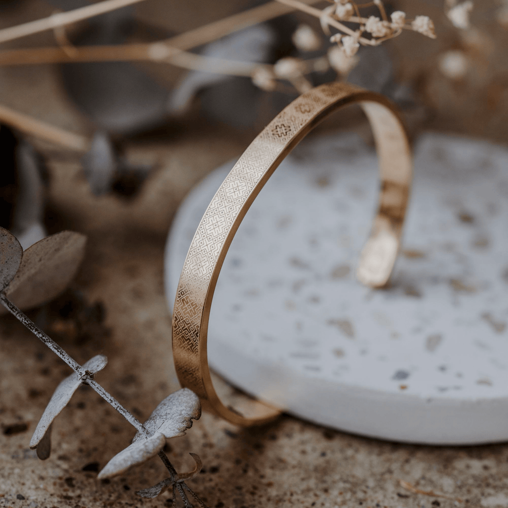 Apzeltīta titāna rokassprādze "Nacionālā josta"